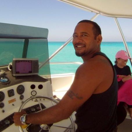 Captain Alex Edwards on a Pro 48 custom dive boat